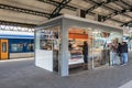 Customers buying sweets at kiosk in Den Bosch train station