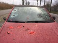 Den bosch, The Netherlands, 25-12-2019: a small red peugot which has been demolished with a sharp object Royalty Free Stock Photo