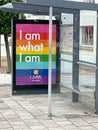 Rainbow colored advertisement on street