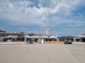 Den Haag Scheveningen boulevard during spring with people by the ferry wheel boulevard Royalty Free Stock Photo