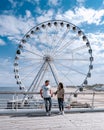 Den Haag Scheveningen boulevard during spring with people by the ferry wheel boulevard Royalty Free Stock Photo