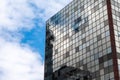 Den Haag, South Holland, The Netherlands - Reflections of looking glass of a contemporary office building