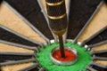 Den Helder, Netherlands. August 2022. Close up of a dart in the bullseye ye of the dartboard. Royalty Free Stock Photo