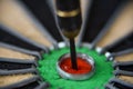 Den Helder, Netherlands. August 2022. Close up of a dart in the bullseye ye of the dartboard. Royalty Free Stock Photo