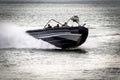 DEN HELDER, THE NETHERLANDS - JUL 7, 2012: Dutch Marines in a MST 1000 Enforcer speedboat during an assault demo at the Dutch Navy