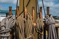 Den Helder, the Netherlands. July 31 2021. The ropework and corvine nails on the deck of an old ship. Royalty Free Stock Photo