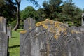 Den Helder, Netherlands, June 2022. Old dilapidated Jewish graves at the cemetery of Den Helder.