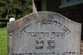 Den Helder, Netherlands, June 2022. Old dilapidated Jewish graves at the cemetery of Den Helder.