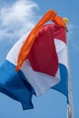 Den Helder, Netherlands. May 31, 2023. Flying dutch flag with orange banner.