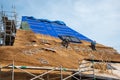 Den Helder, Netherlands. September 2022. Thatchers work on a new thatched roof.