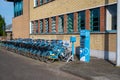 Dendermonde, East Flemish Region, Belgium - Blue bike cycling sharing at the railway station