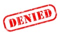 DENIED red rubber worn out stamp text on white background Royalty Free Stock Photo