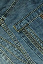 Denim abstract stitched background with pocket, blue jeans fabric texture with seams, youth concept