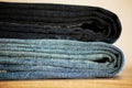 Denim blue jeans stack texture background closeup. Royalty Free Stock Photo