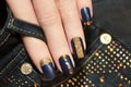 Denim blue manicure. Royalty Free Stock Photo