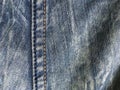 Denim with classic stitching. Denim texture abstraction.