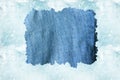 A denim cloth against a light blue water backgroun Royalty Free Stock Photo