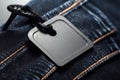 Denim clothing fabric close-up with cardboard price tag mockup. AI generated