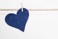 Denim heart hanging on string