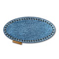 Denim oval shape with stitches. Jeans patch with seam. Royalty Free Stock Photo