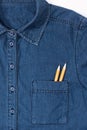 Denim shirt with two pencils in pocket Royalty Free Stock Photo