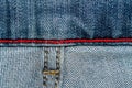 Denim texture with red seam for jeans background Royalty Free Stock Photo