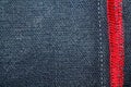 Denim texture with red seam for jeans background Royalty Free Stock Photo