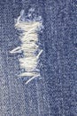 Denim torn blue jeans texture Royalty Free Stock Photo