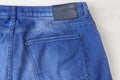 Denim trousers, fragment with a back pocket Royalty Free Stock Photo