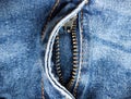 Denim zipper in the middle. Jeans blue, textile. View from above. place for text. Open zipper on jeans. Close-up Royalty Free Stock Photo