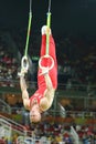 Denis Abliazin of Russian Federation competes at the Men`s Rings Final on artistic gymnastics competition at Rio 2016 Olympic Game Royalty Free Stock Photo