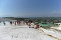 Denizli, Turkey. - July 20.2019. Tourists walk on a snow-white terraces at Pamukkale