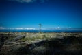 Denman Island, Vancouver Island, British Columbia, Canada: the typical beach atmosphere; driftwood on the gravel sand and Royalty Free Stock Photo