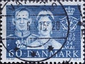 DENMARK - CIRCA 1960: A postage stamp from Denmark showing a portrait of King Frederik and Queen Ingrid on the silver wedding