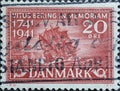 DENMARK - CIRCA 1941: A postage stamp from Denmark showing a historic sailing ship by Vitus Behring after the stranding on Bering