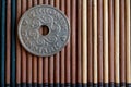 Denmark coin denomination is 5 krone (crown) lie on wooden bamboo table, good for background or postcard