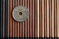 Denmark coin denomination is one krone (crown) lie on wooden bamboo table, good for background or postcard - back side Royalty Free Stock Photo