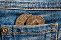 Denmark coins denomination is five and two krone (crown) in the pocket of old worn denim jeans Royalty Free Stock Photo