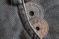 Denmark coins denomination is 5 and 2 krone (crown) in the pocket of old brown denim jeans Royalty Free Stock Photo