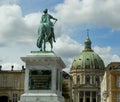 Denmark, Copenhagen, Amalienborg Palace Square, statue of King Frederick V and the dome of the Marble Church Royalty Free Stock Photo