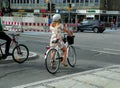 Denmark, Copenhagen, H. C. Andersens Blvd, Danish woman on bike