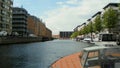 Denmark, Copenhagen, Overgaden Oven Vandet, view of the canal, Five Circles Pedestrian Bridge and the Black Diamond building