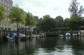 Denmark, Copenhagen, Overgaden Oven Vandet, view of the canal and yachts near the pier from the ship Royalty Free Stock Photo