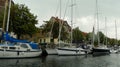 Denmark, Copenhagen, Overgaden Oven Vandet, view of the canal and yachts near the pier from the ship Royalty Free Stock Photo