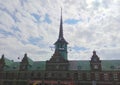 Denmark, Copenhagen, Ved Stranden, view of the spire of the Borsen from the boat Royalty Free Stock Photo