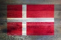 Denmark flag on rustic old wood surface background Royalty Free Stock Photo