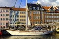 Denmark - Zealand region - Copenhagen city center - panoramic view of the Nyhavn district with boats and tenement houses along the Royalty Free Stock Photo