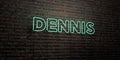 DENNIS -Realistic Neon Sign on Brick Wall background - 3D rendered royalty free stock image