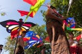 DENPASAR/BALI-JUNE 15 2019: Balinese children, wearing traditional Balinese clothes, prepare to play traditional kites at the Bali Royalty Free Stock Photo