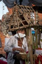 DENPASAR/BALI-MAY 7 2020: Hindu religious ceremonies in Bali when the pandemic covid-19 broke out. They do the ceremony and stick